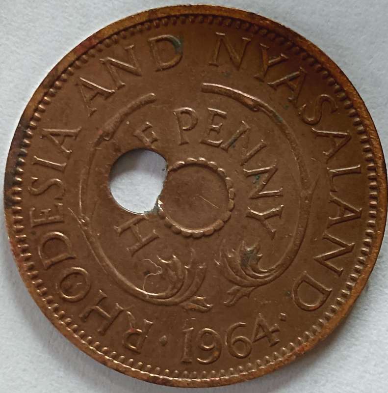 Rhodesia & Nyasaland Half Penny 1964 error strike off-centre hole