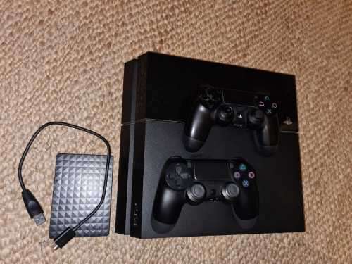 PS4 500gb + 2 WIRELESS REMOTES + 1TB EXTERNAL + 8 GAMES   |   MaKe An OfFeR