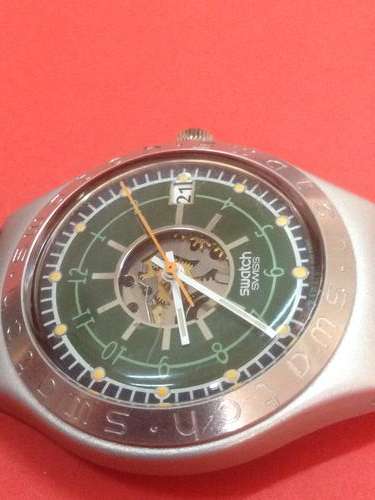 SWATCH IRONY GREEN SKELETON