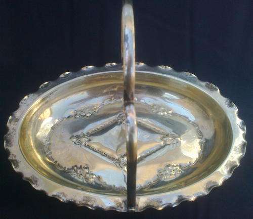 VINTAGE EPNS OBLONG BOWL WITH HANDLE (adjustable) AND 4 BUN FEET