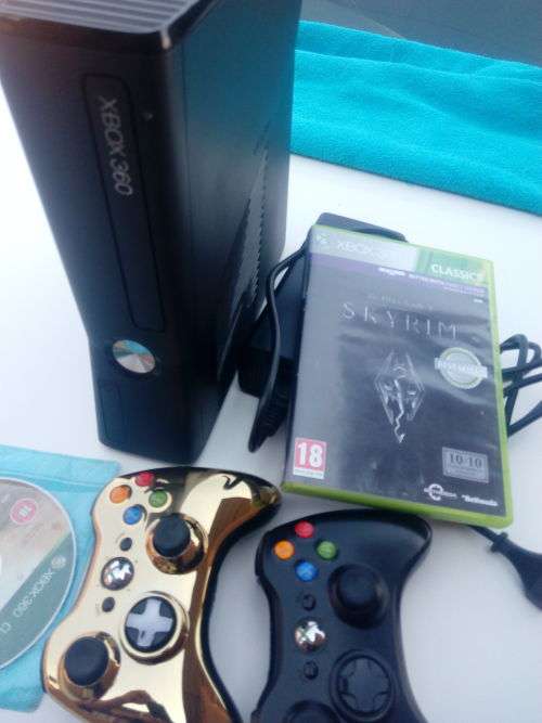 *** Xbox 360 Slim 250 Gig and two games two controllers ( 1 Gold Edition )