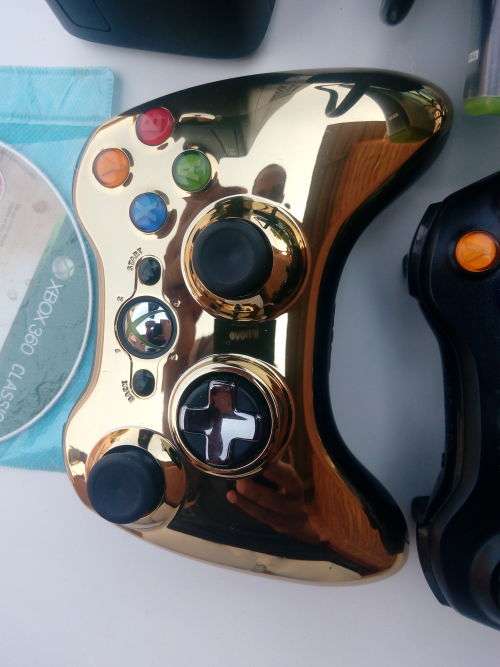 *** Xbox 360 Slim 250 Gig and two games two controllers ( 1 Gold Edition )