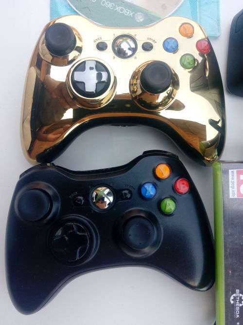 *** Xbox 360 Slim 250 Gig and two games two controllers ( 1 Gold Edition )