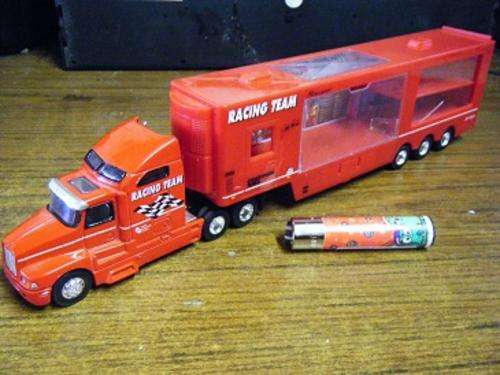 RACING TEAM TRUCK-BY REALTOY-GOOD CONDITION-BUT 1 WINDOW CRACK-NO BOX