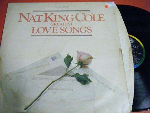 NAT KING COLE-GREATEST LOVE SONGS LP-COVER HAVE WATER MARKS-VINYL IN MINT CONDITION