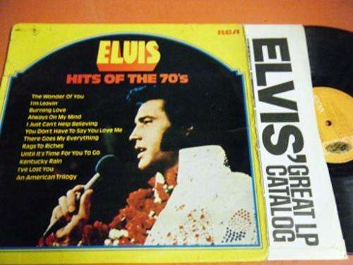 ELVIS HITS OF THE 70'S LP-COVER HAS A TEAR-LP IN GOOD CONDITION