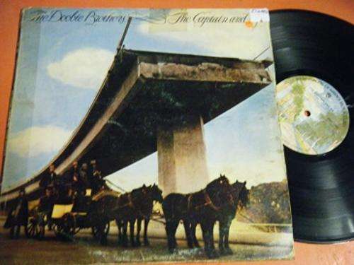 THE DOOBIE BROTHERS-THE CAPTAIN AND ME-COVER IS WORN-THE VINYL IS IN VERY GOOD CONDITION