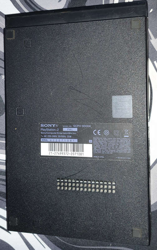 Playstation 2 Super Slim with 7 Games, new controler and memory card