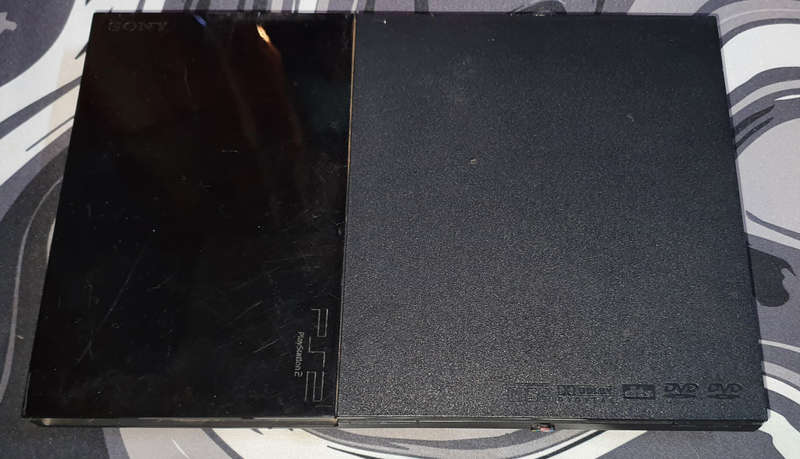 Playstation 2 Super Slim with 7 Games, new controler and memory card