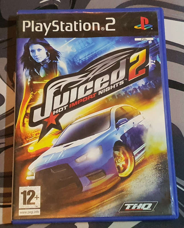 Playstation 2 Super Slim with 7 Games, new controler and memory card