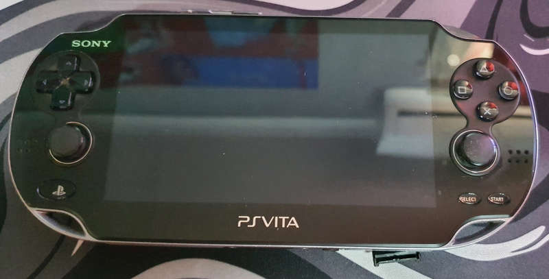 PSVITA 1000 with 3g module. with 8gb memory card and 2 games. Right joystick drift