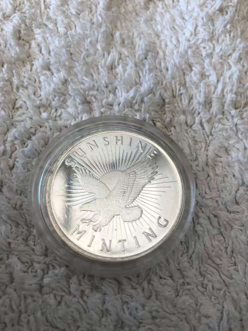 1 oz silver mint coin 99999 silver (Low Start price)
