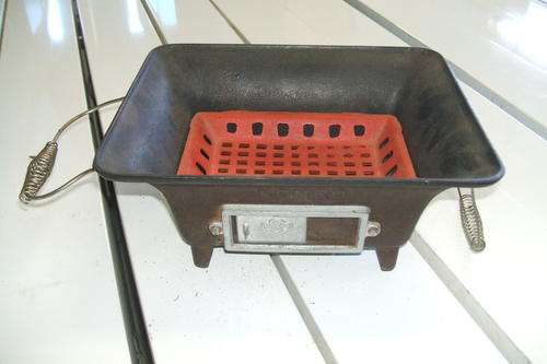 Antique cast iron foot heater