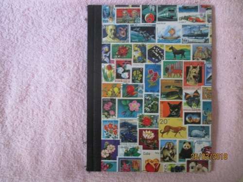 CLEAN A4 STOCKBOOK FULL OF MIXED WORLD STAMPS