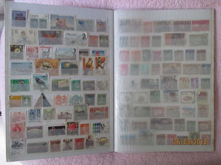 CLEAN A4 STOCKBOOK FULL OF MIXED WORLD STAMPS