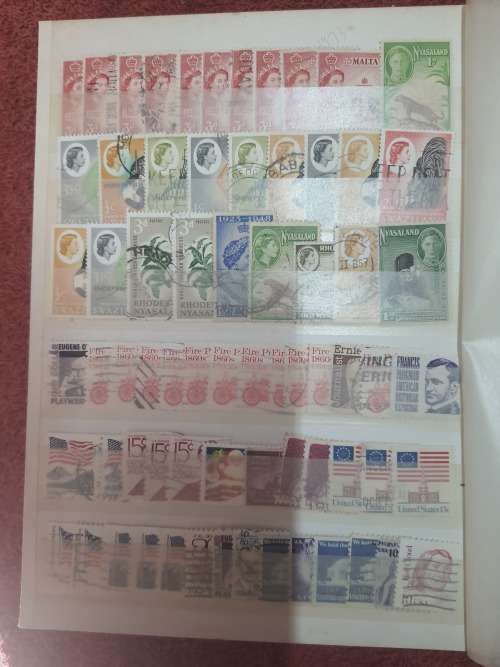 A5 GREEN STOCKBOOK LOADED WITH MIXED WORLD STAMPS 16/32 PAGE