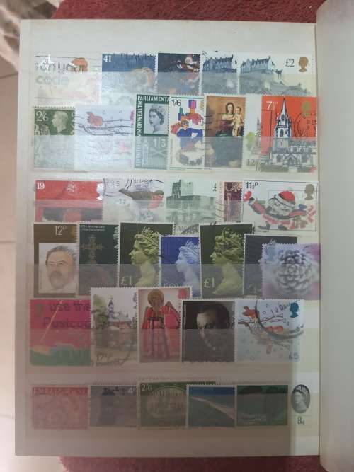 A5 GREEN STOCKBOOK LOADED WITH MIXED WORLD STAMPS 16/32 PAGE