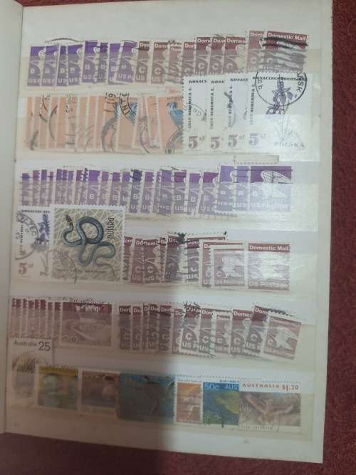 A5 GREEN STOCKBOOK LOADED WITH MIXED WORLD STAMPS 16/32 PAGE