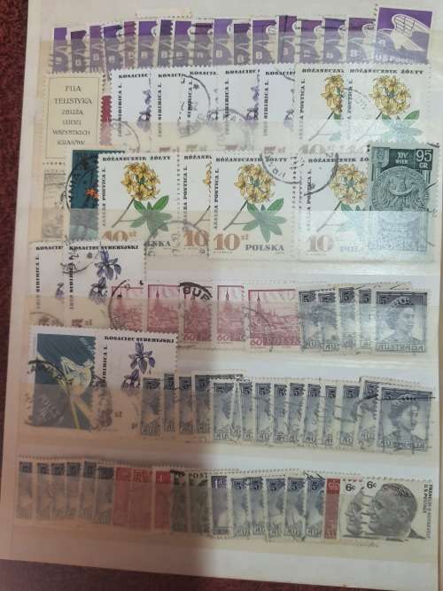 A5 GREEN STOCKBOOK LOADED WITH MIXED WORLD STAMPS 16/32 PAGE