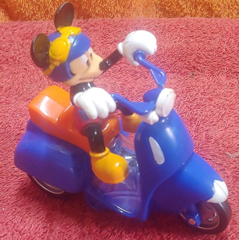 MICKEY MOUSE ON SCOOTER IN GREAT CONDITION CONDITION