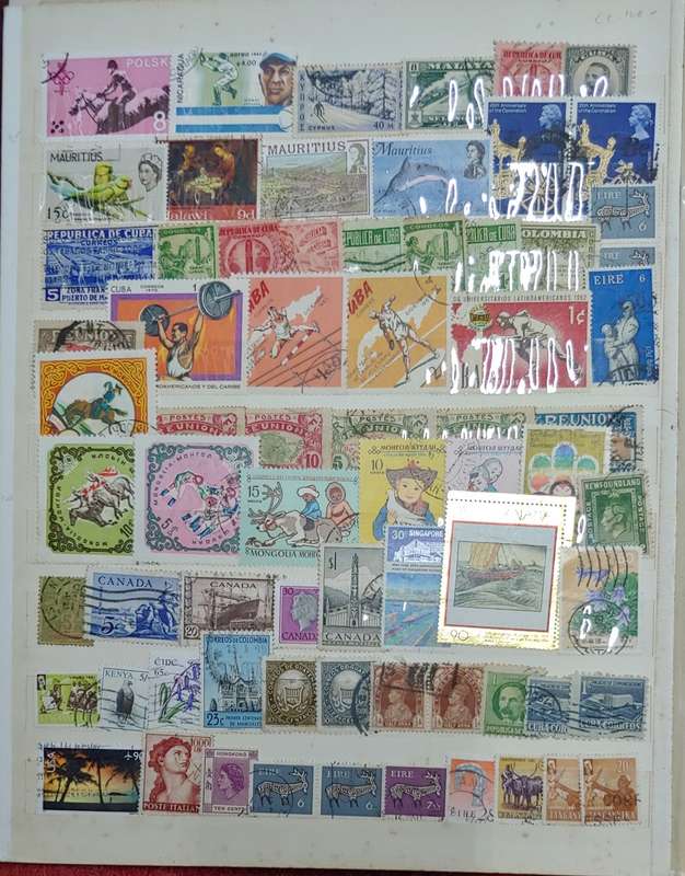 USED A4 STOCKBOOK FULL OF MIXED WORLDS STAMPS 12/24 PAGES