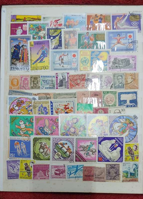 USED A4 STOCKBOOK FULL OF MIXED WORLDS STAMPS 12/24 PAGES