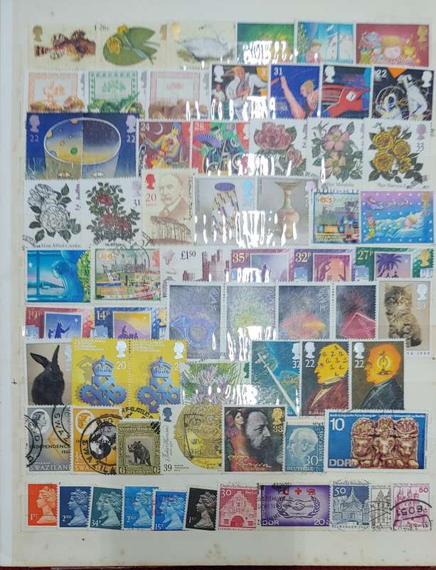 USED A4 STOCKBOOK FULL OF MIXED WORLDS STAMPS 12/24 PAGES