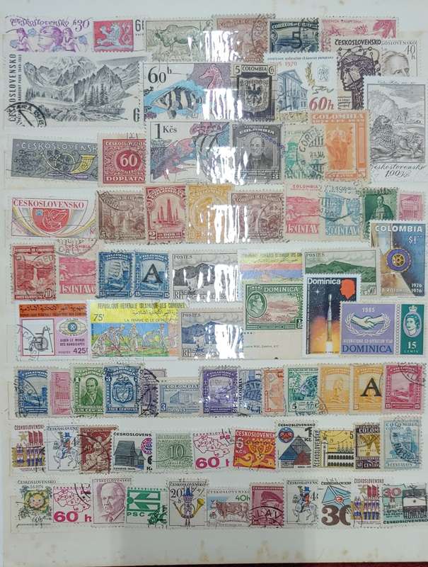 USED A4 STOCKBOOK FULL OF MIXED WORLDS STAMPS 12/24 PAGES