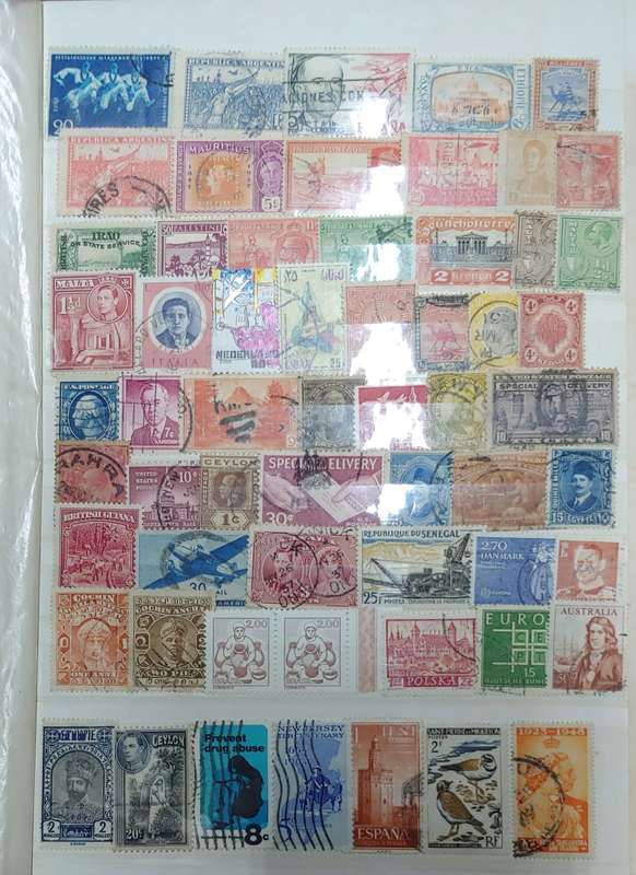 USED GREEN A4 STOCKBOOK FULL OF MIXED WORLD STAMPS 8/16 PAGES