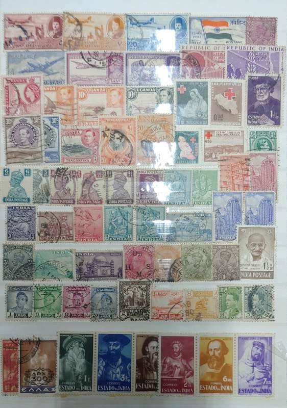 USED GREEN A4 STOCKBOOK FULL OF MIXED WORLD STAMPS 8/16 PAGES