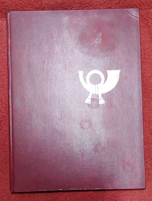USED MAROON A4 STOCKBOOK WITH BLACK PAGES MIXED WORLD STAMPS 8/16 PAGES