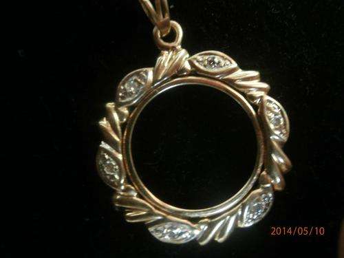 STUNNING 9 CARAT GOLD/DIAMOND COIN PENDANT
