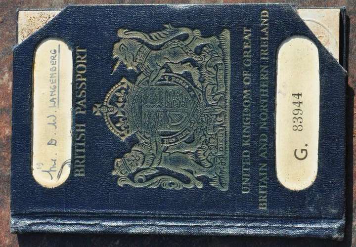 Original vintage BRITISH PASSPORT (cancelled) with lots of visas, mainly Germany & Uganda
