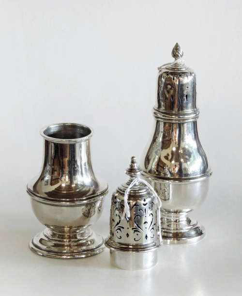 Two hallmarked silver sugar castor - London 1927 & Birmingham 1907