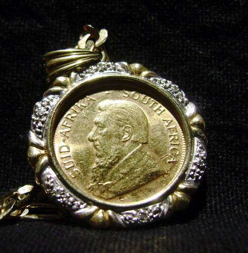 ## 1/4 OZ ## - Kruger Rand Set in Diamonds - ## With Chain ##