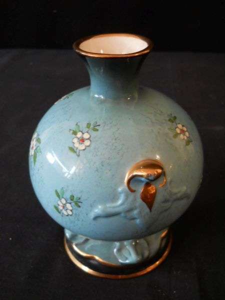 Rare James Kent Staffordshire England Serena Vase ~ 15cm high Description     A very rare and hard to find vase from James Kent, Old Foley in the Serena pattern, hand painted with gold gilding.  It is a beautiful color blue with embossed scattered small flowers with black trim on top and bottom.