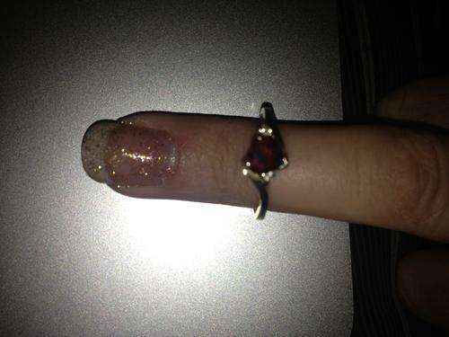 9ct yellow gold with 2 small diamonds of 0.4ct and a hart shaped ruby