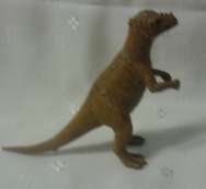 Theropods  Dinosaur Toy (+-3 cm High) (+-10 cm Long)