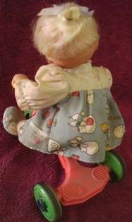 Doll on a Tricycle