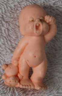 Kewpie doll - small plastic 5 cm