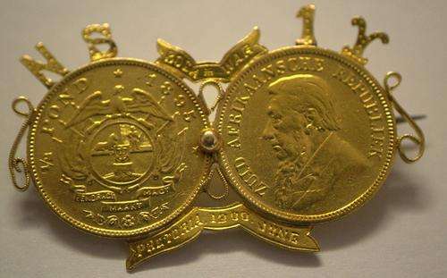 Handmade brooch made with a 1895 and a 1896 Kruger 1/2 pond coins