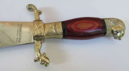 decorative dagger in cow hide sheath, metal blade with makers mark and cow hand engraving VGC