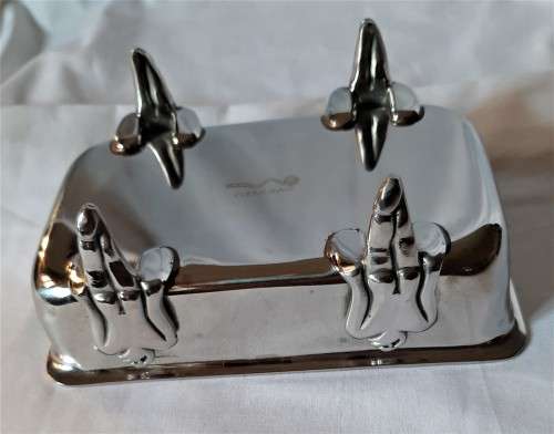 Seldom seen Carrol Boyes Stainless Steel oblong soap or sauce dish with 4 standing man feet. VGC