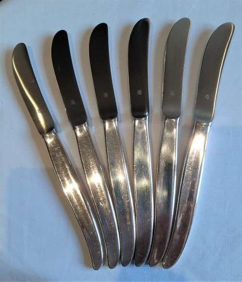 Set of 6 WMF German made SP table knives, fully marked in good used condition.