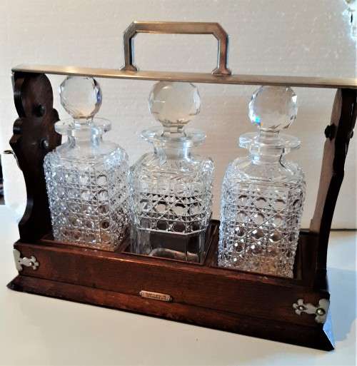 Awesome Mappin and Webb Antique Oak 3 bottle Tantalus with locking mechanism and original key