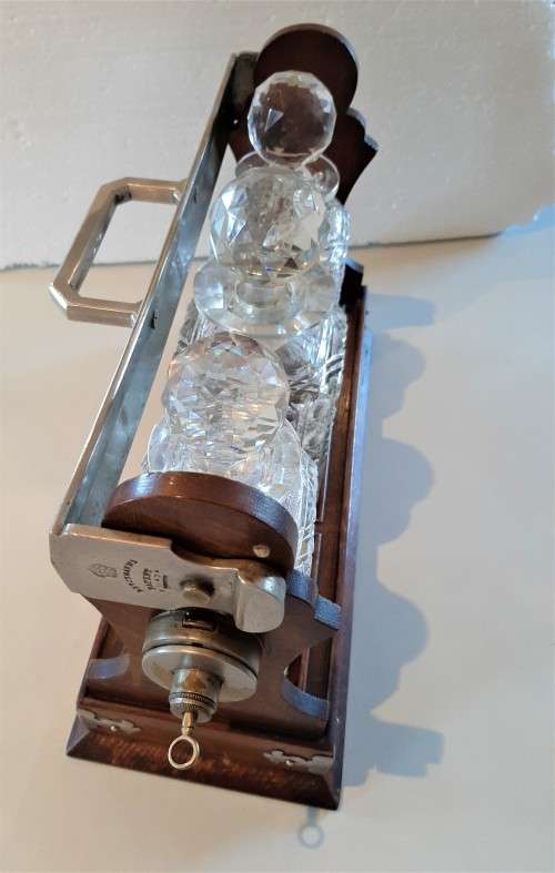 Awesome Mappin and Webb Antique Oak 3 bottle Tantalus with locking mechanism and original key