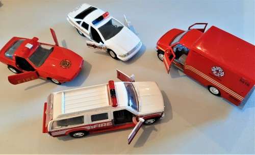 Selection of larger DIE CAST Service Fire and Police model vehicles, one friction van included. VGC