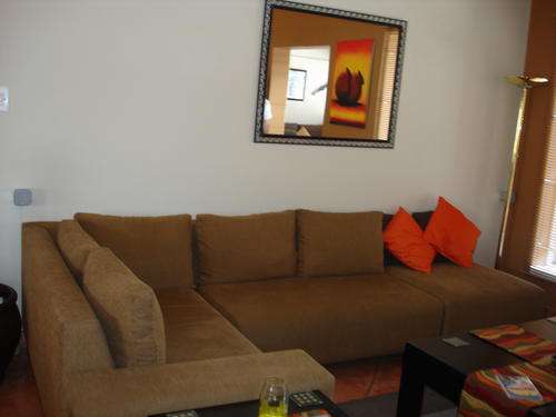 Corner Lounge Suite (Golden Brown) in excellent condition