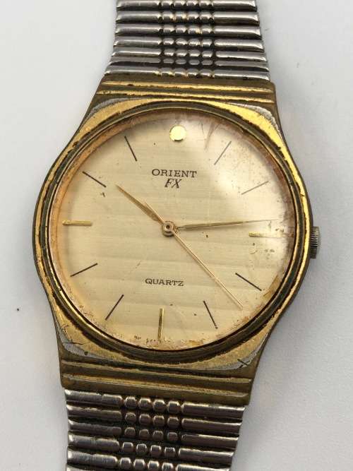 Two Orient FX Gent`s Dress Quartz Watches (See Description)