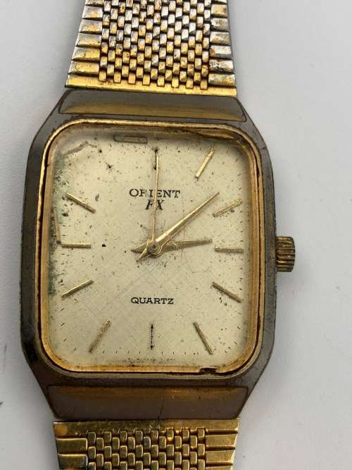 Two Orient FX Gent`s Dress Quartz Watches (See Description)